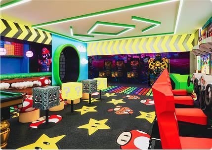 Mario Kart inspired gaming room featuring racing seats, LED ceiling lighting, and interactive themed decor.