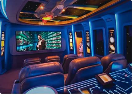 Futuristic spaceship inspired home theater design with luxury recliners and immersive lighting for cinematic experience.